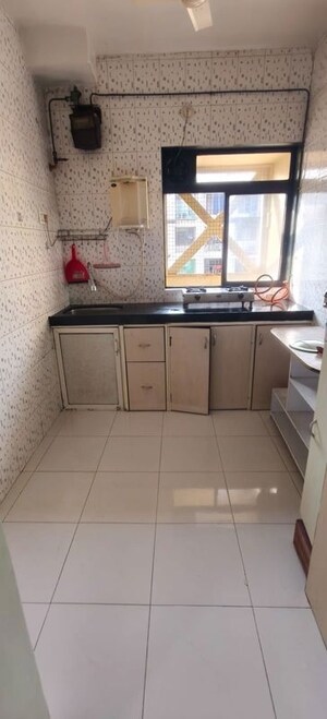 Kitchen in 1 BHK Apartment at Shreya CHS, Nerul Sector 27 – for Rent