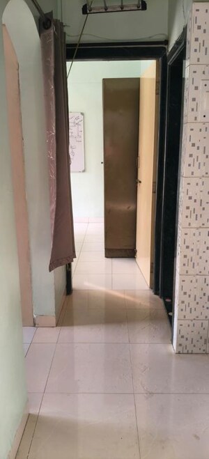 Building Lobby in 1 BHK Apartment at Shreya CHS, Nerul Sector 27 – for Rent