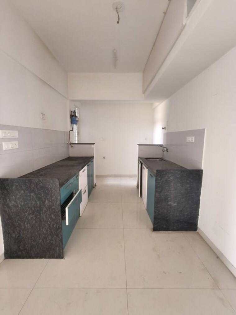 Kitchen, vasupujya-neco-beaumont 2 Bedroom 1000 Sq.Ft. Apartment In Nibm Annexe Pune 10214938