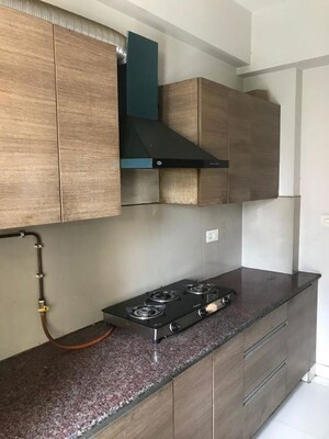 Kitchen in 2 BHK Apartment at ABA Corp Orange County, Ahinsa Khand 1 – for Rent