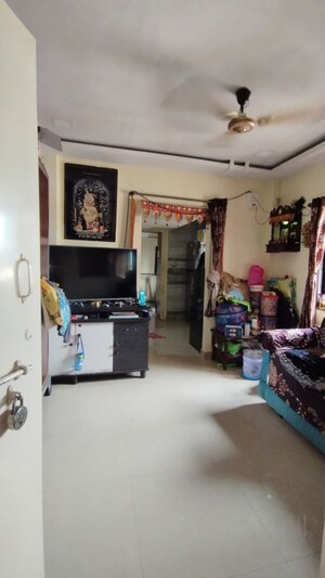 Living Room in 1 BHK Apartment at Royal Nest Malad West, Malad West – for Rent