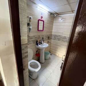 Bathroom in 2.5 BHK Apartment at Amrapali Zodiac, Sector 120 – for Rent
