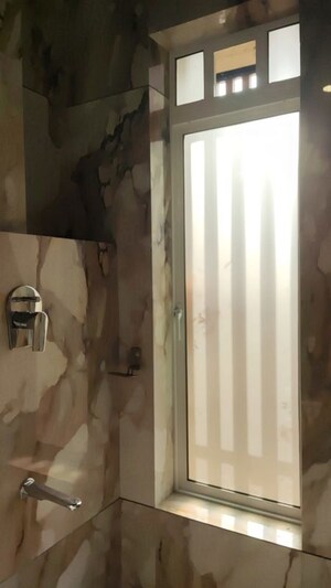 Bathroom in 2 BHK Apartment at Darshan Heights, Charni Road – for Sale