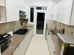 Kitchen in 3 BHK Apartment at Emaar Palm Premier, Sector 77 – for Rent