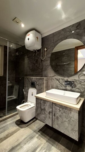 Bathroom in 3 BHK Builder Floor at Sushant Lok I – for Sale