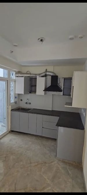 Kitchen in 3 BHK Apartment at Rishabh Hindon Green Valley, Ahinsa Khand 2 – for Sale