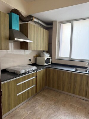 Kitchen in 2 BHK Apartment at Unitech Escape, Sector 50 – for Rent