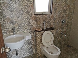 Bathroom in 2 BHK Apartment at Megapolis Symphony, Hinjewadi – for Rent