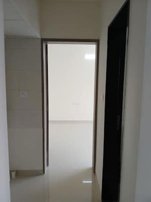 Building Lobby in 1 BHK Apartment at Paranjape Trident Twin Towers, Wakad – for Rent