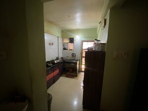 Kitchen in 2 BHK Apartment at Ghadge Patil Manik Park Residency, Bopkhel – for Sale