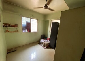 Room in 2 BHK Apartment at Ghadge Patil Manik Park Residency, Bopkhel – for Sale