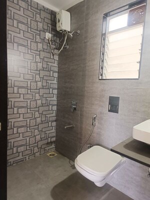 Bathroom in 2 BHK Apartment at Dhamji Shamji Mahavir Spring Tulip Phase 1, Pokhran Road No Two – for Sale