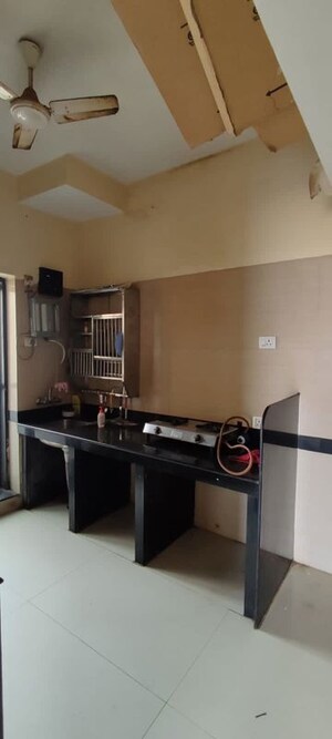 Kitchen in 3 BHK Apartment at K Raheja Heights, Malad East – for Rent