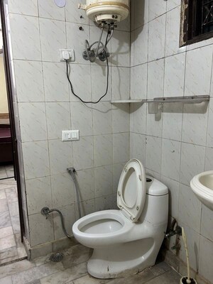 Bathroom in 1 RK Apartment at Aman Luxury Apartments, Sahastradhara Road – for Rent