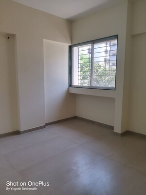 Room in 2 BHK Apartment at Ajit Green City, Shivane – for Rent