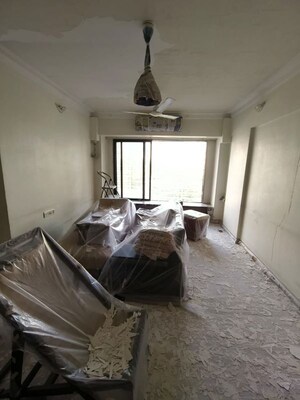 Living Room in 3 BHK Apartment at Shagun CHS, Malad East – for Rent