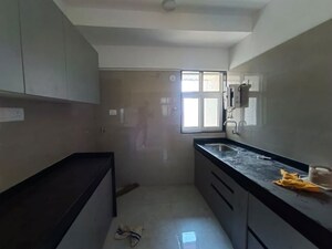 Kitchen in 2 BHK Apartment at Vaibhav Queens Park, Chembur – for Rent