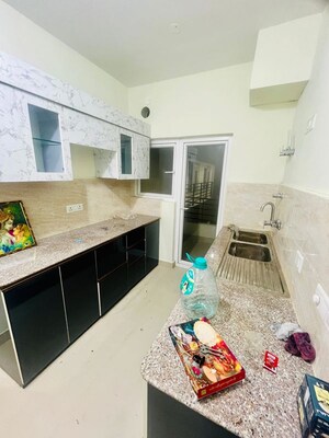 Kitchen in 3 BHK Apartment at Pardos Okas Residency, Sushant Golf City – for Rent