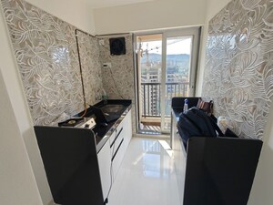 Kitchen in 1 BHK Apartment at Raunak Residency Thane, Pokhran Road No One – for Rent