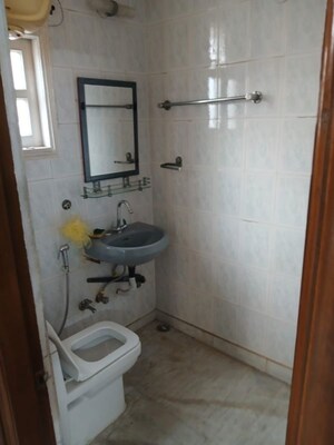 Bathroom in 3 BHK Builder Floor at Kalkaji – for Rent