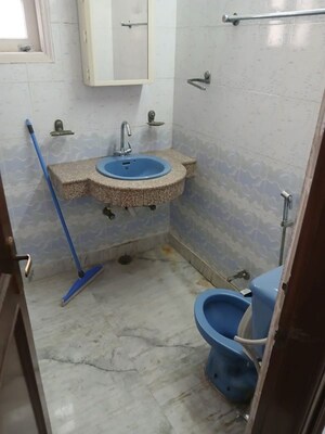 Bathroom in 3 BHK Builder Floor at Kalkaji – for Rent