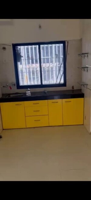 Kitchen in 3 BHK Apartment at Geetanjali CHS Goregaon West, Goregaon West – for Rent