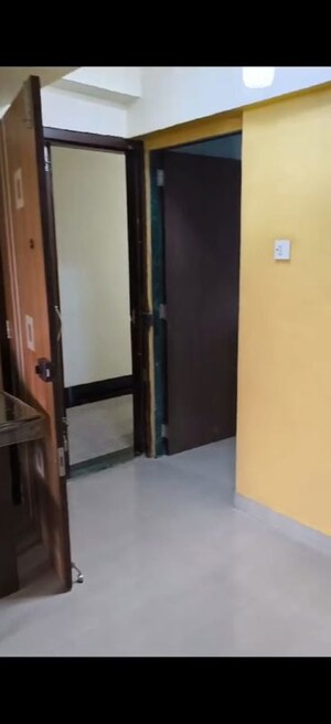 Room in 2 BHK Apartment at Raghukul Building, Goregaon East – for Rent