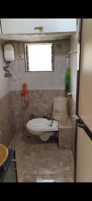 Bathroom in 2 BHK Apartment at Raghukul Building, Goregaon East – for Rent