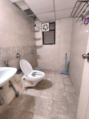 Bathroom in 3 BHK Apartment at Kolte Patil Margosa Heights, Mohammadwadi – for Rent