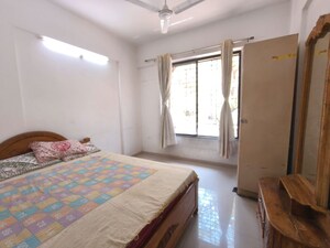 Bedroom in 3 BHK Apartment at Kolte Patil Margosa Heights, Mohammadwadi – for Rent
