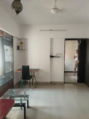 Living Room in 1.5 BHK Apartment at Runwal Garden City, Balkum Pada – for Rent