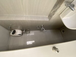 Bathroom in 3 BHK Apartment at Runwal Gardens, Dombivli East – for Rent