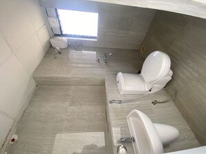 Bathroom in 1 BHK Apartment at Runwal Gardens Phase I, Dombivli East – for Rent