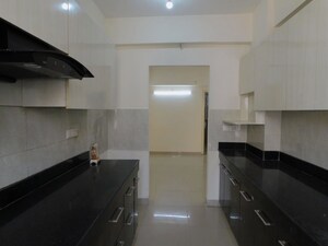 Kitchen in 2 BHK Apartment at Nilaya Greens, Raj Nagar Extension – for Rent