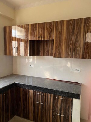 Kitchen in 2 BHK Apartment at Nilaya Greens, Raj Nagar Extension – for Rent