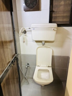 Bathroom in 1 BHK Apartment at Swapnadeep CHS, Mulund West – for Rent