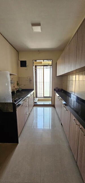 Kitchen in 2 BHK Apartment at Raunak Laxmi Narayan Residency, Pokhran Road No Two – for Rent