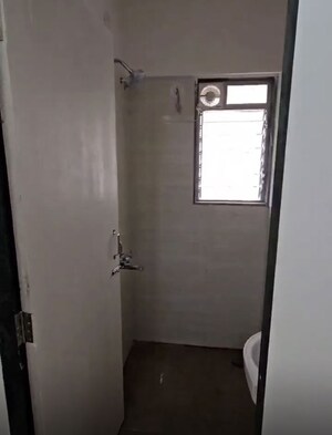Bathroom in 1 BHK Apartment at Seth Cypress  CHS, Mulund West – for Rent