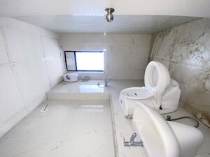 Bathroom in 1 BHK Apartment at Runwal Gardens, Dombivli East – for Rent