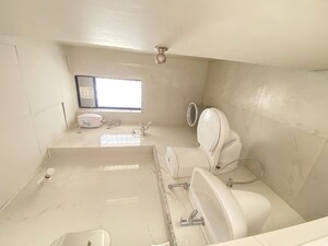 Bathroom in 1 BHK Apartment at Runwal Gardens, Dombivli East – for Rent