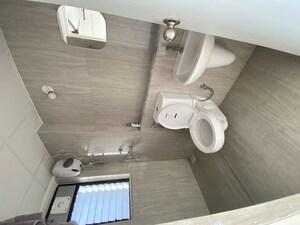 Bathroom in 1 BHK Apartment at Runwal Gardens, Dombivli East – for Rent