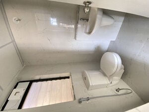 Bathroom in 1.5 BHK Apartment at Runwal Gardens Phase 2, Dombivli East – for Rent