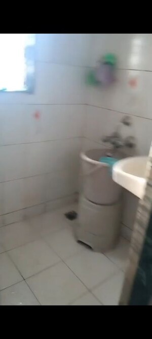 Bathroom in 1 BHK Apartment at Gharkul CHS, Vile Parle East – for Rent