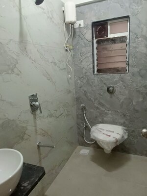 Bathroom in 1 BHK Apartment at Gulmohar CHS Goregaon, Goregaon West – for Rent