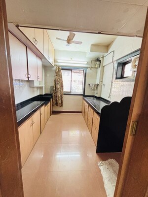 Kitchen in 1 BHK Apartment at Swapna Mahal CHS, Mulund West – for Sale