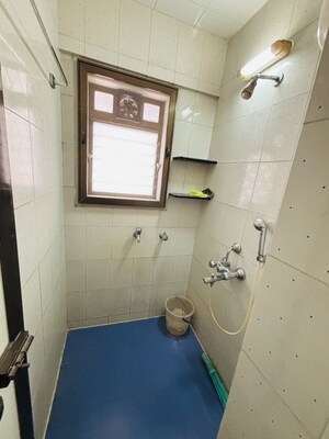 Bathroom in 1 BHK Apartment at Swapna Mahal CHS, Mulund West – for Sale
