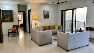 Living Room in 4 BHK Apartment at Shapoorji Pallonji Vanaha Golfland, Bavdhan – for Rent