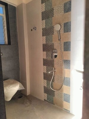 Bathroom in 2 BHK Apartment at Ambarish CHS, Kurla East – for Rent