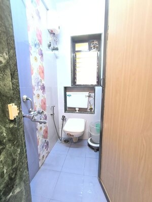 Bathroom in 1 BHK Apartment at Manali Building, Malad West – for Rent