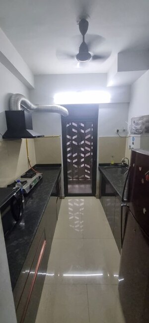 Kitchen in 2 BHK Apartment at Lodha Palava Lily, Dombivli East – for Rent